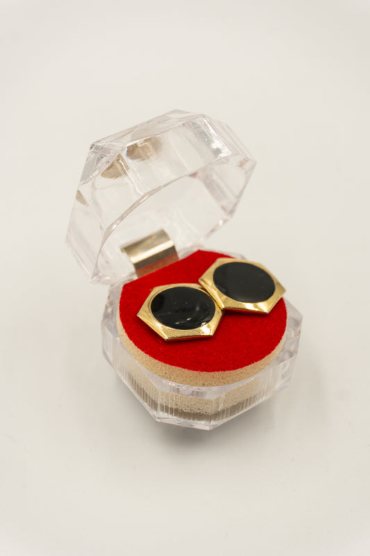 Mancuernilla en forma de hexagono color dorado con el centro negro - MAN - 027